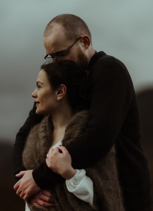 a couple emotionally cuddling after their glance elopement